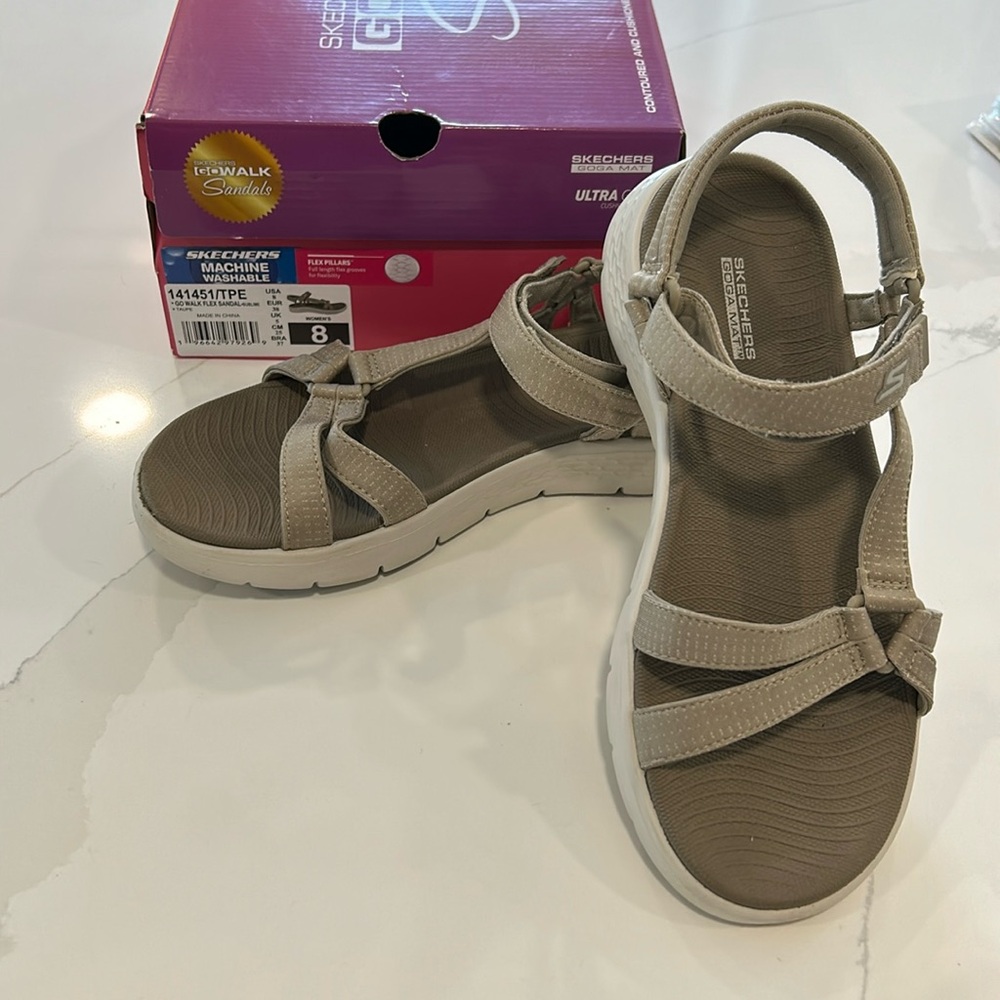 Two pairs of Skechers Go Walk sandals, women’s size 8